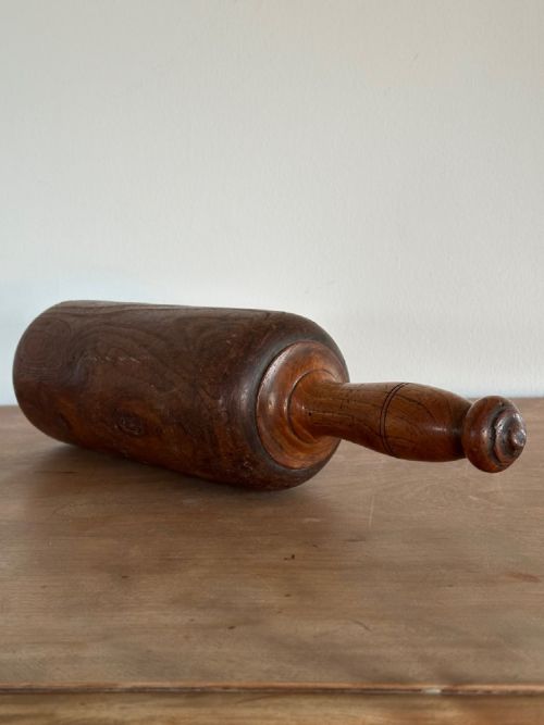 A RARE 19TH CENTURY ENGLISH TURNED AND CARVED ELM ROLLING PIN