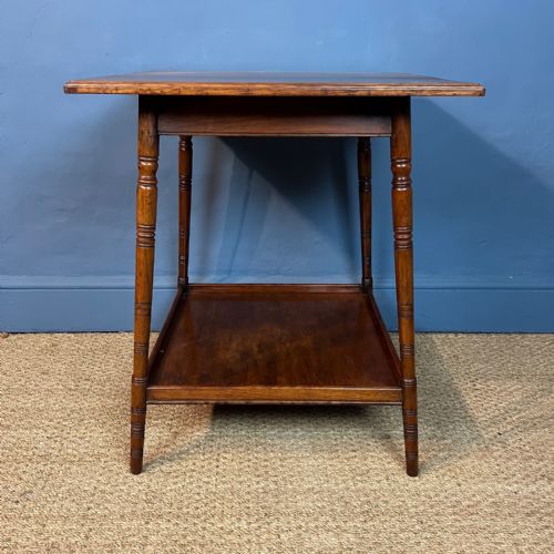 AN AESTHETIC MOVEMENT WALNUT 2 TIER TABLE CIRCA 1880