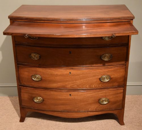 A LATE 18TH CENTURY MAHOGANY BOW FRONTED CHEST OF DRAWERS - ADDITIONAL PHOTO 1