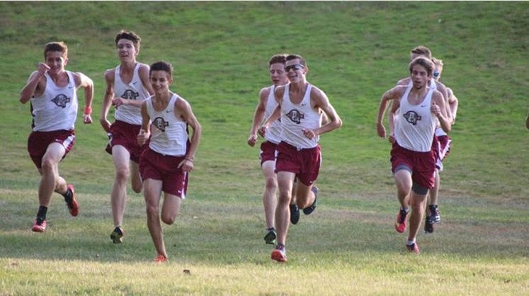 The boys warm up for their upcoming meet. 