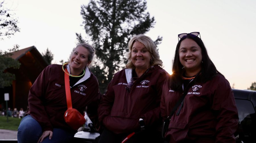 Head Coach Terry Dewing photographed alongside coach Sobczak and assistant coach Soberano.