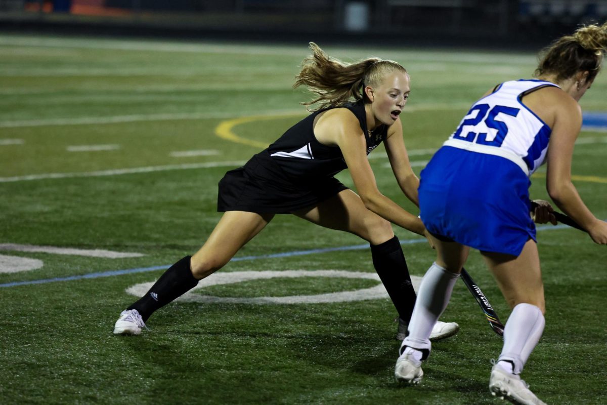 Junior Katie Smith one-on-one battle against Highland Park.