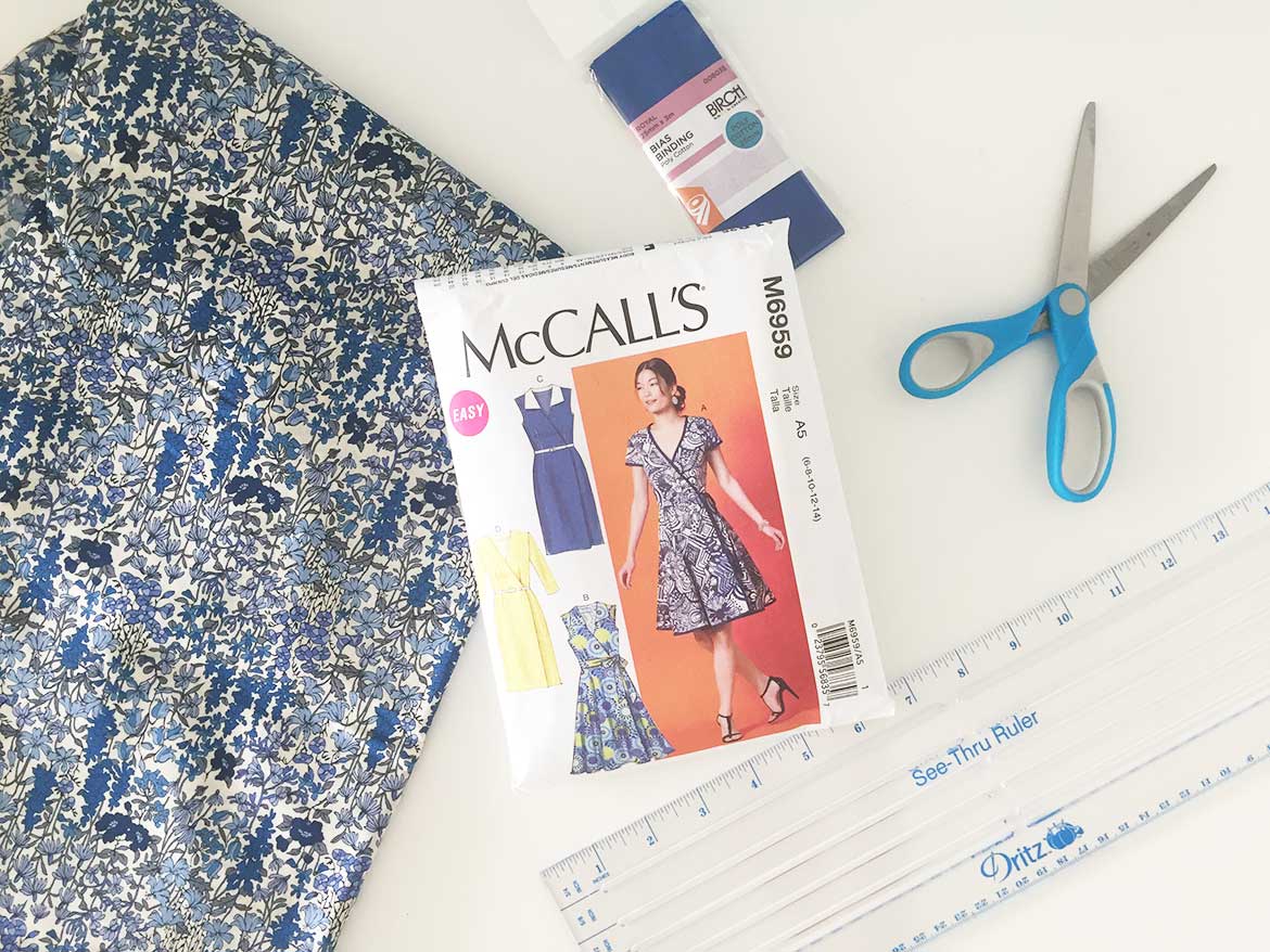 McCall Patterns M6959 Wrap Dress Sewing Pattern | Join me in a sew along to make this wrap dress with short sleeves and flared skirt. I'll be making my dress from this blue floral Japanese lawn fabric.