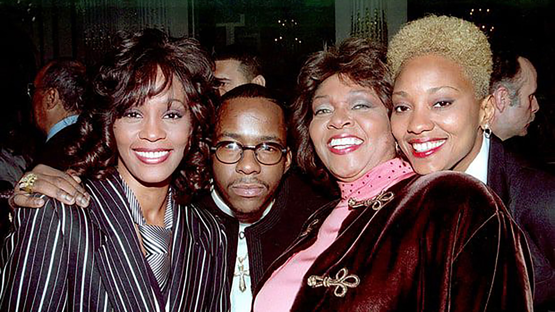 Robyn Crawford (far right) details her. romantic relationship with Whitney Houston (far left) in new book. Also pictured: Bobby Brown and Cissy Houston.