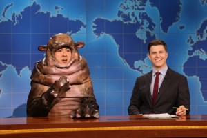 SATURDAY NIGHT LIVE -- Episode 1865 -- Pictured: (l-r) Bowen Yang as Moo Dang the hippo and Colin Jost during Weekend Update on Saturday, September 28, 2024 -- (Photo by: Will Heath/NBC via Getty Images)