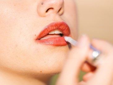 Woman using lippie