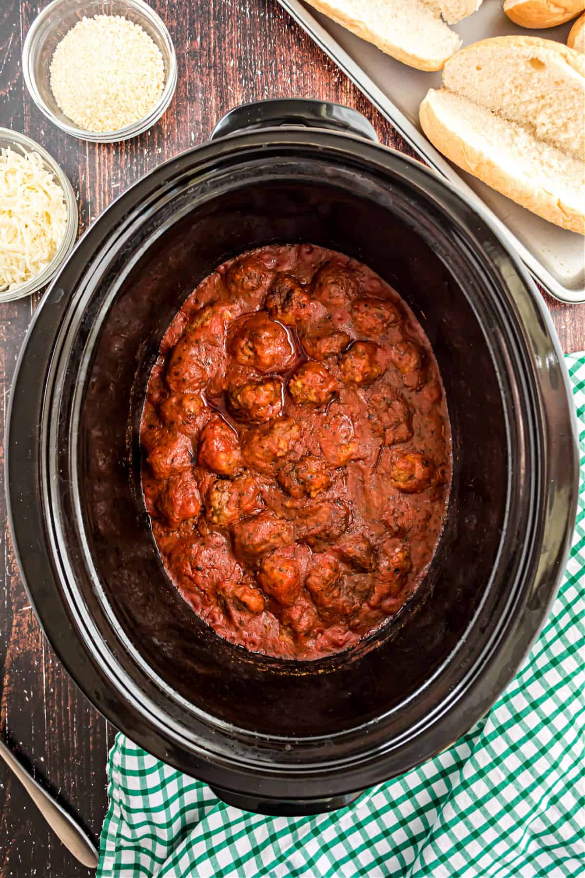 Meatballs in marinara sauce in crockpot.