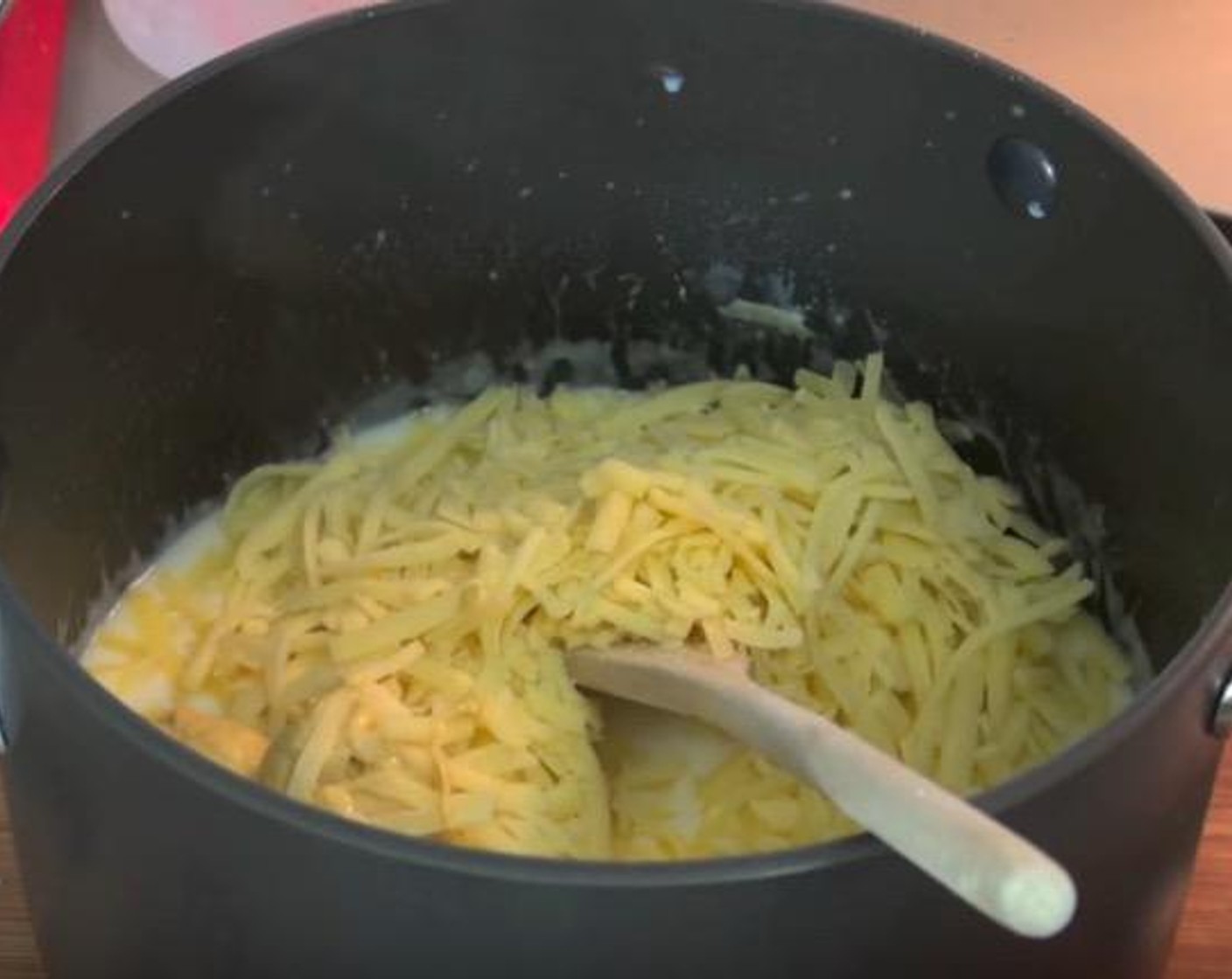 step 4 Add Cheddar Cheese (2 cups), Dijon Mustard (2 tsp) and Cayenne Pepper (1 pinch). Stir together until smooth.