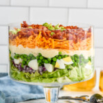 Trifle dish of Seven Layer Salad ingredients