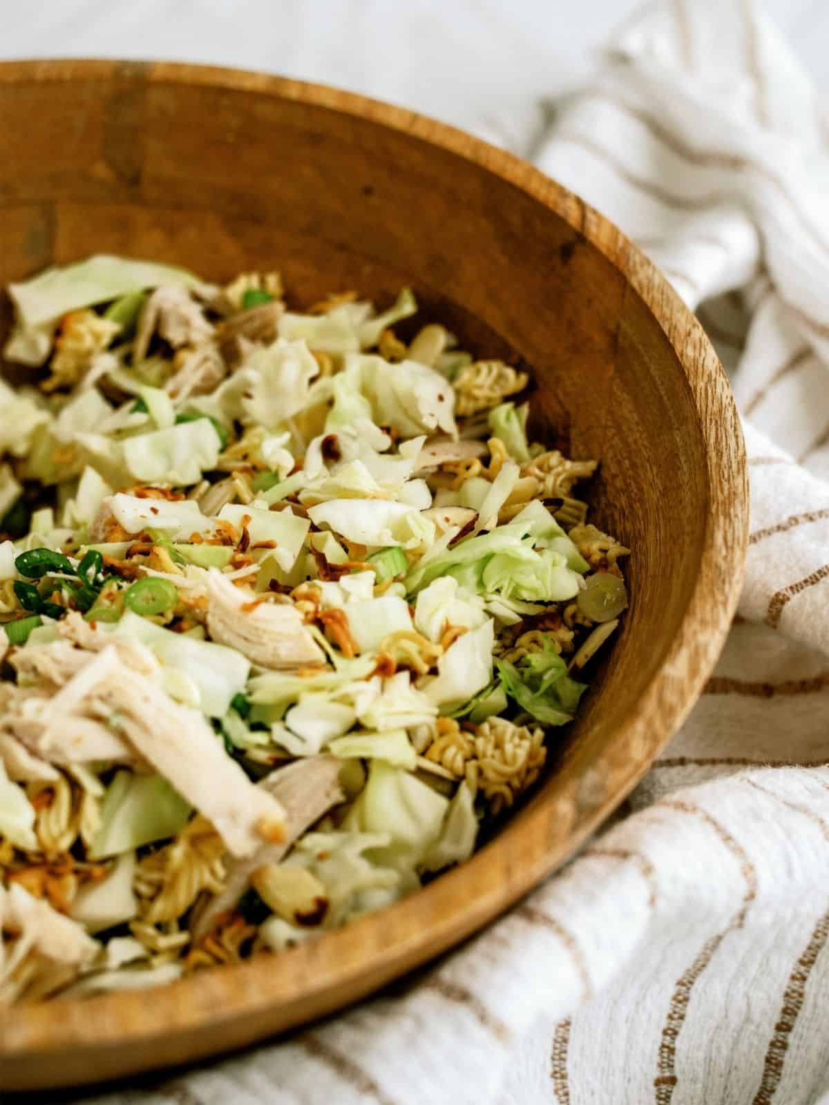 Ramen Noodle Oriental Chicken Salad in a wood bowl