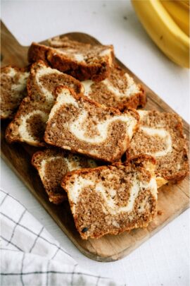 Cream Cheese Banana Bread sliced on a cutting board