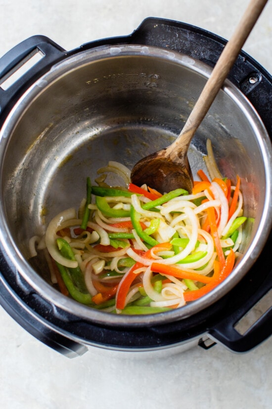 bell peppers and onions in pot