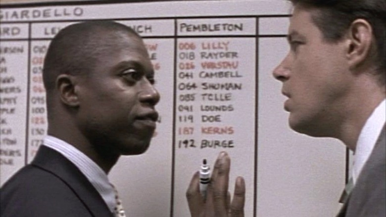 Pembleton shows Bayliss how the board works