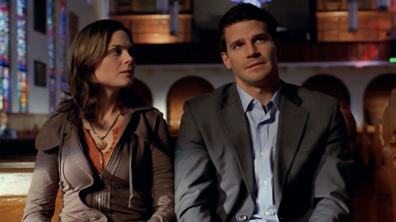 Brennan and Bones sitting in a church together in Bones