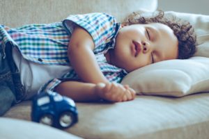 baby napping on couch