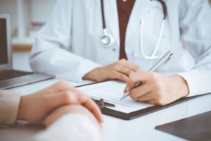 Doctor talking with patient