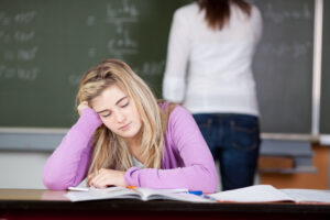 tired student in classroom