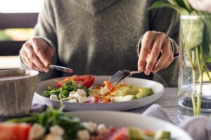 woman eating healthy meal