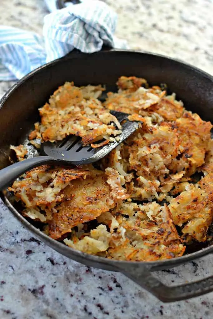 Crispy fried potatoes in a cast iron skillet