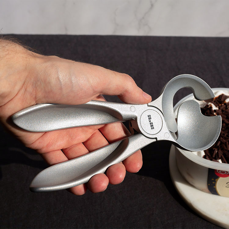 Ice cream scooper with opening function