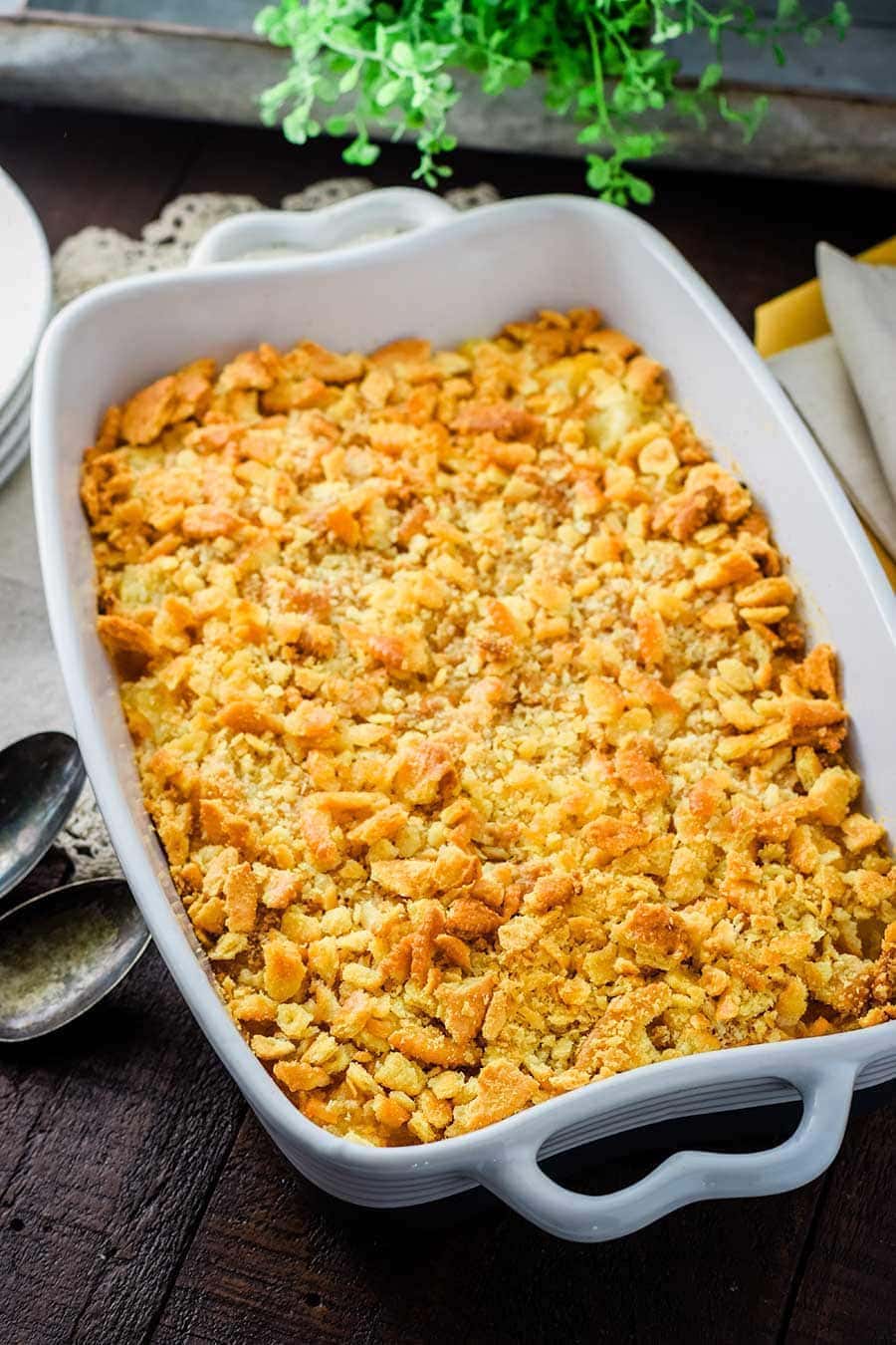 A bowl of Pineapple Casserole on a table.