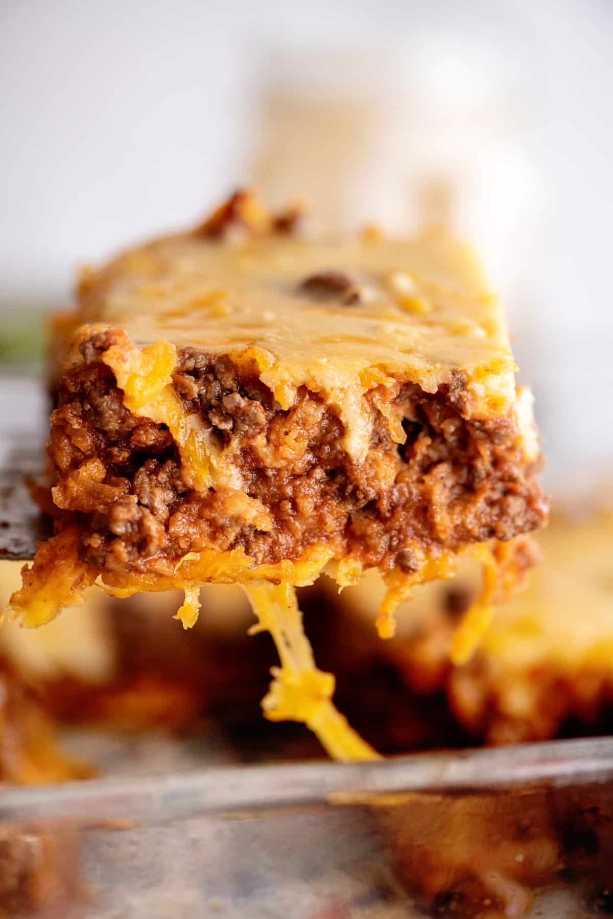 Close-up of slice of sloppy joes casserole.