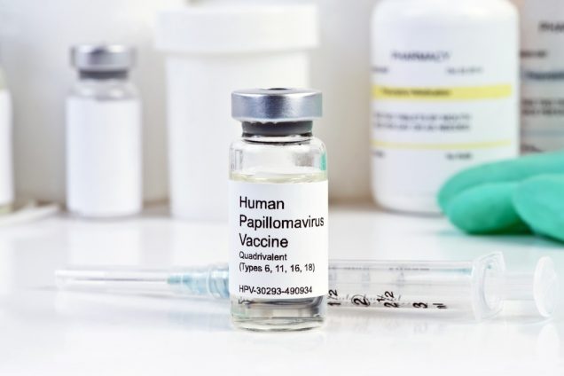 Human Papilloma Virus vaccine with syringe and vial at a clinic.