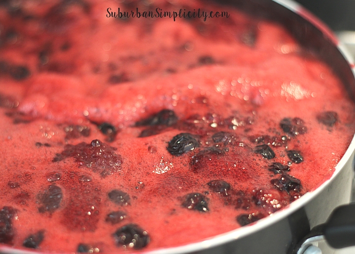 Mixed berries cooking on the stove. 