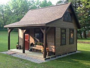 Outside photo of Coastal Show's outdoor shed/office which has a second space in the loft which can be used for storage.