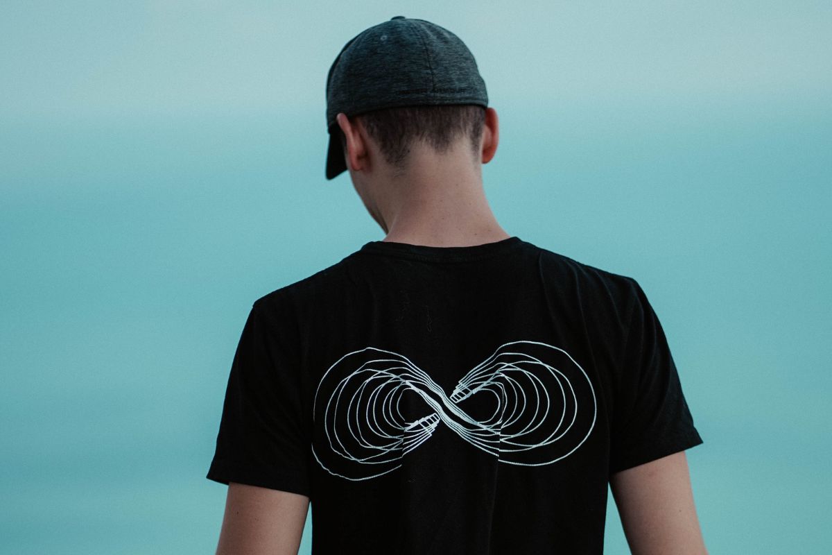 A customized t shirt with infinity design printed on it.