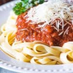 homemade pasta sauce with fettuccini on a plate