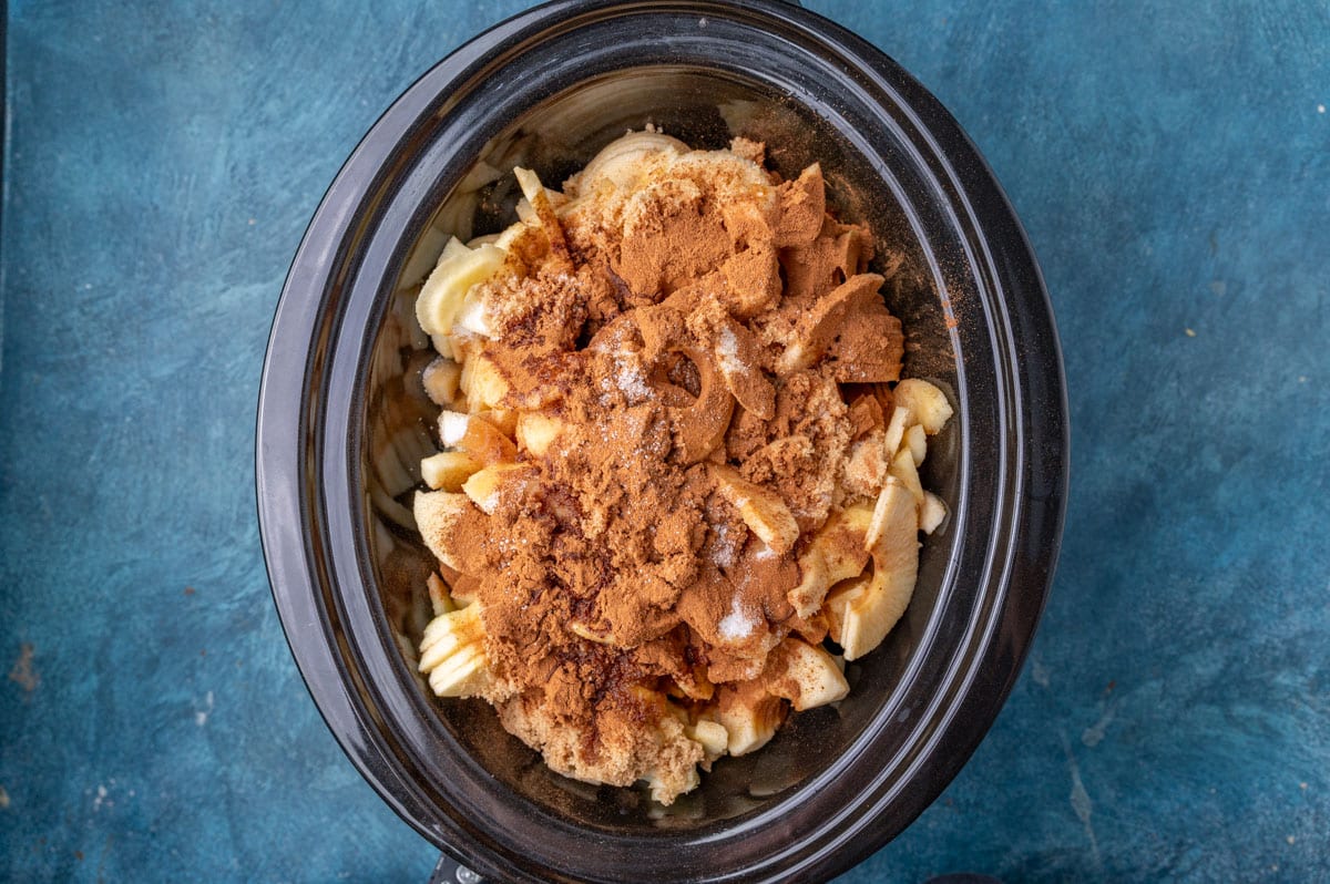 ingredients for apple butter in a slow cooker