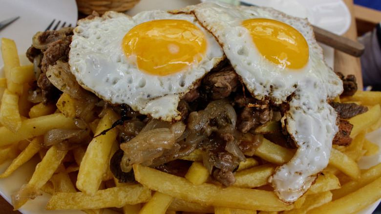 fries with meat and eggs