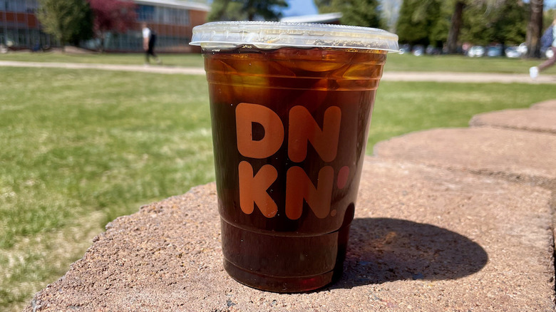 Iced coffee, grass in background