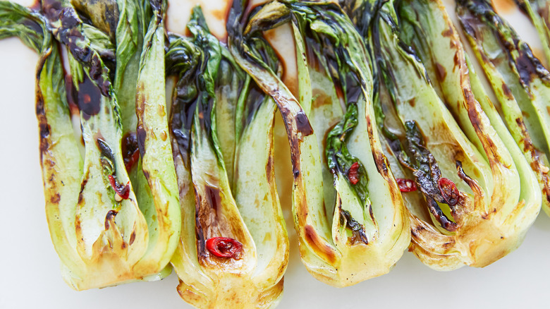 Grilled bok choy on surface