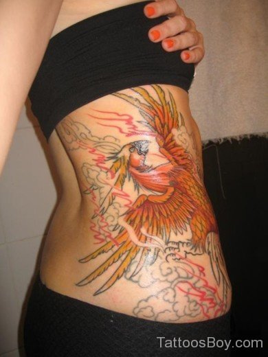 Yellow Phoenix Tattoo On Rib-TB14103