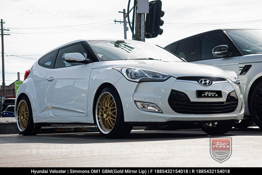 18x8.5 18x9.5 Simmons OM-1 Gold on Hyundai Veloster