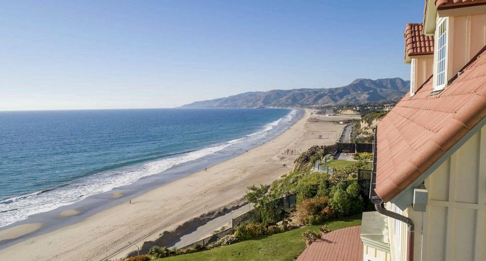  The stunning Malibu home overlooks Pacific Ocean coastline and also views of Catalina Island from its perch on Point Dume Bluff