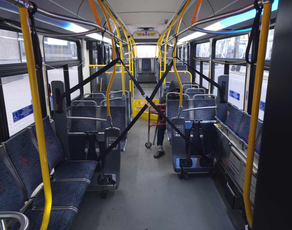  A barrier added to a Detroit bus to help prevent the elderly becoming infected