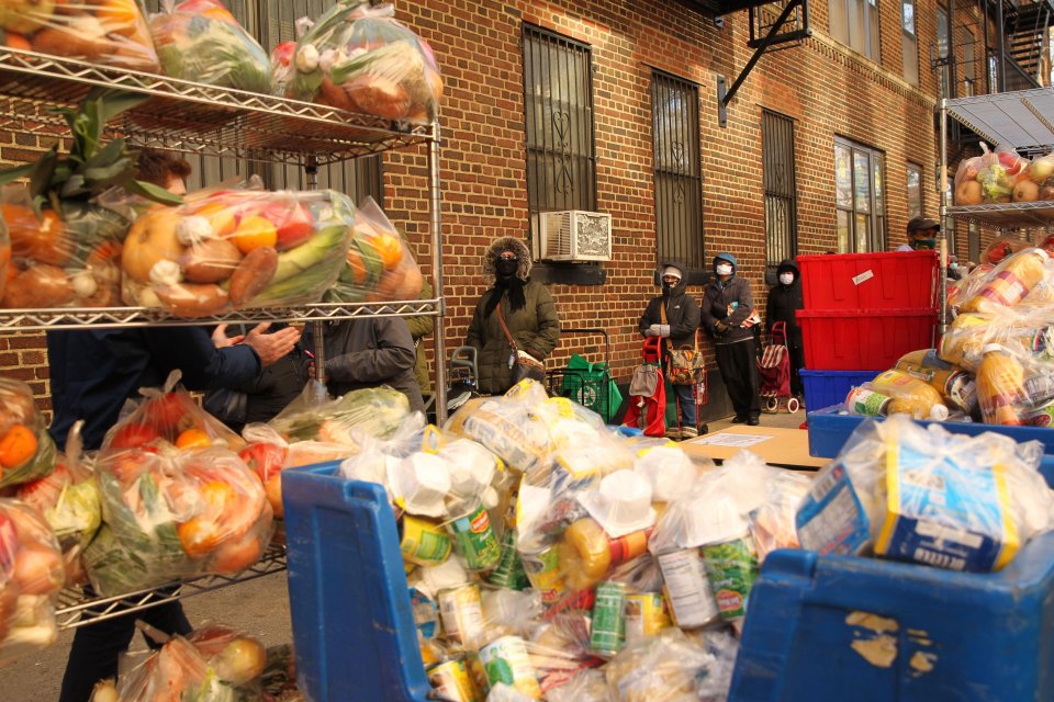 Food is given away in New York City during the 2020 Thanksgiving holiday