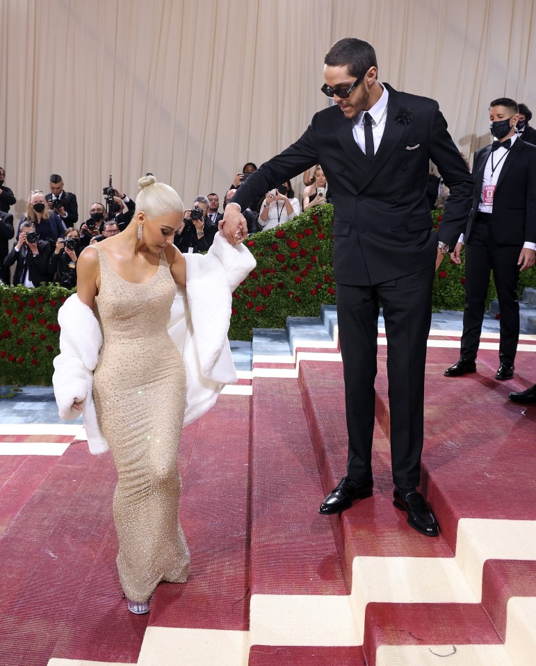 Although she fit into the gown, Kim struggled to walk in it