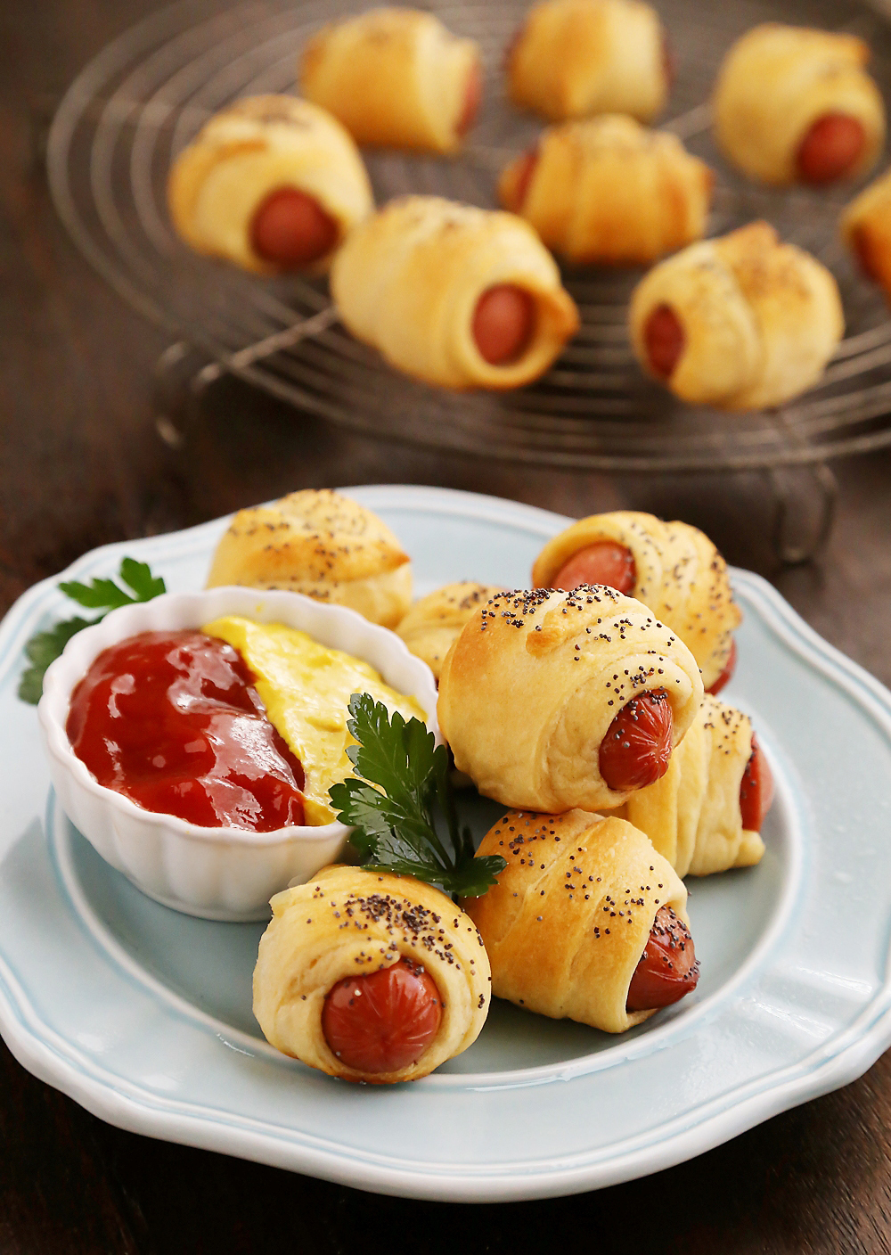 3-Ingredient Crescent Hot Dog Rollups – These fluffy, buttery appetizer bites are perfect for parties + lunchboxes! So delicious and fun to make with kids! Thecomfortofcooking.com