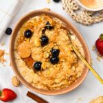 This Peanut Butter Oatmeal bowl is the most creamy, warm healthy breakfast ever packed with proteins, and fiber to keep you full all morning. Plus, this homemade oatmeal recipe is also easy to whip in less than 10 minutes for busy mornings.