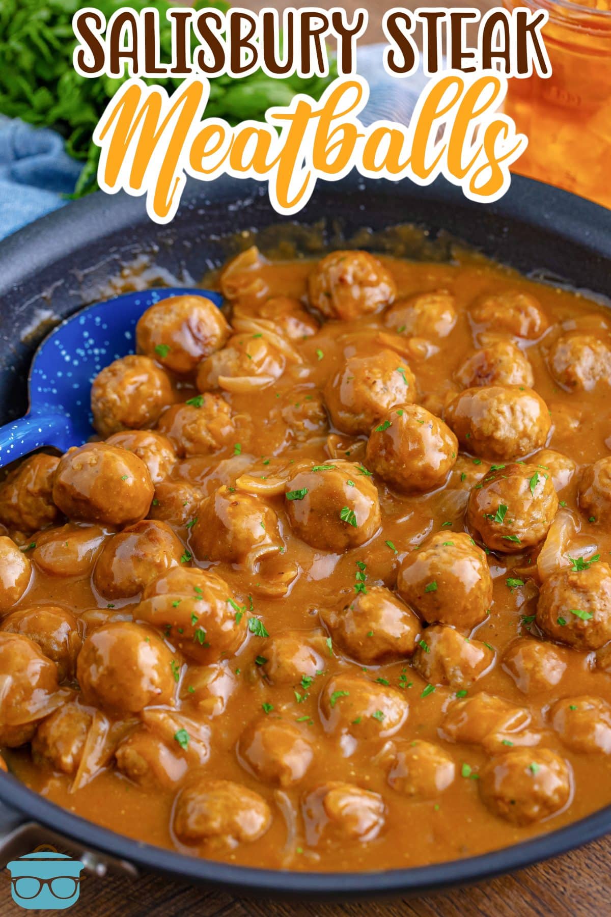 salisbury steak meatballs shown in a large skillet.