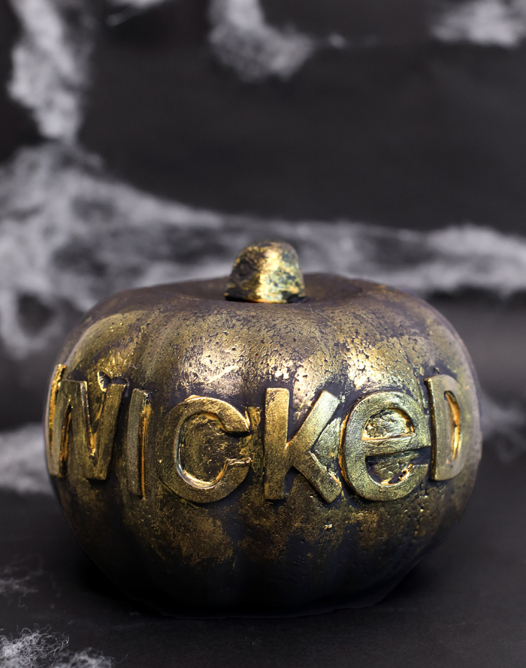 spooky word painted pumpkin