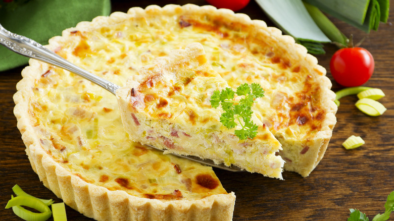 Quiche Lorraine on wooden counter