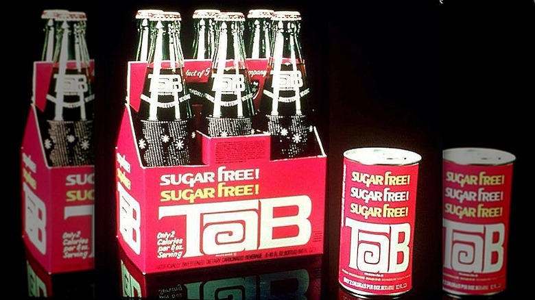 TaB soda bottles and can