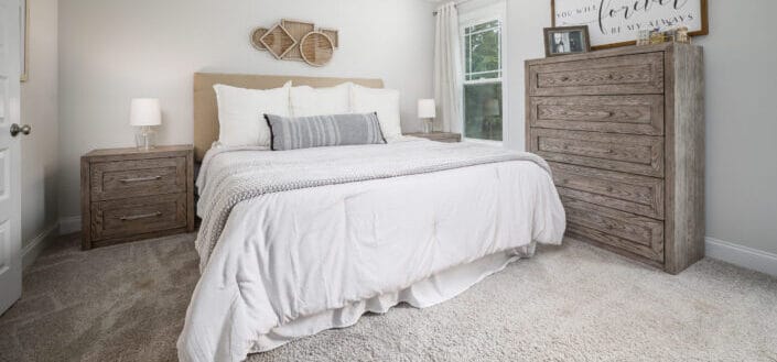 White bed linens in the bedroom