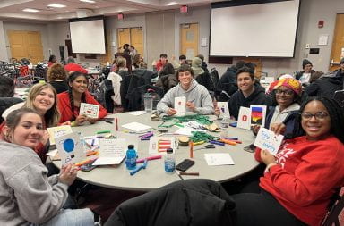 Roughly 600 students gathered in the Ohio Union Monday to participate in student cohort Pay It Forward's annual MLK Jr. Day of Service. Credit: Courtesy of Madi Barnes