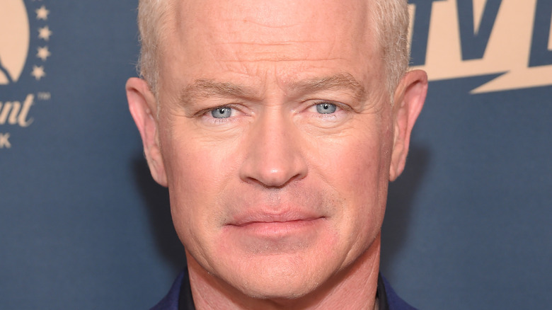 Neal McDonough posing for photo